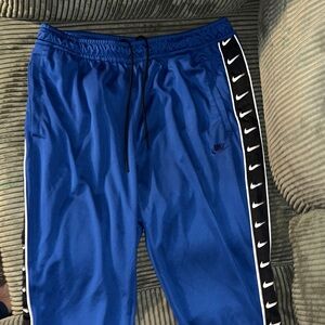 Nike Blue Track Pants with White Accents